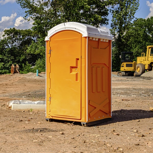 how often are the porta potties cleaned and serviced during a rental period in Promised Land